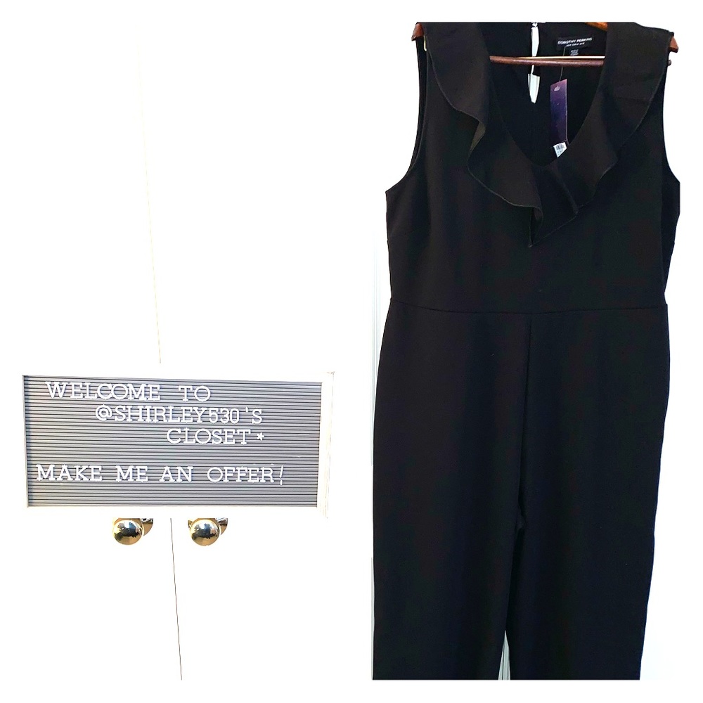 Black jumpsuit with ruffled neckline
